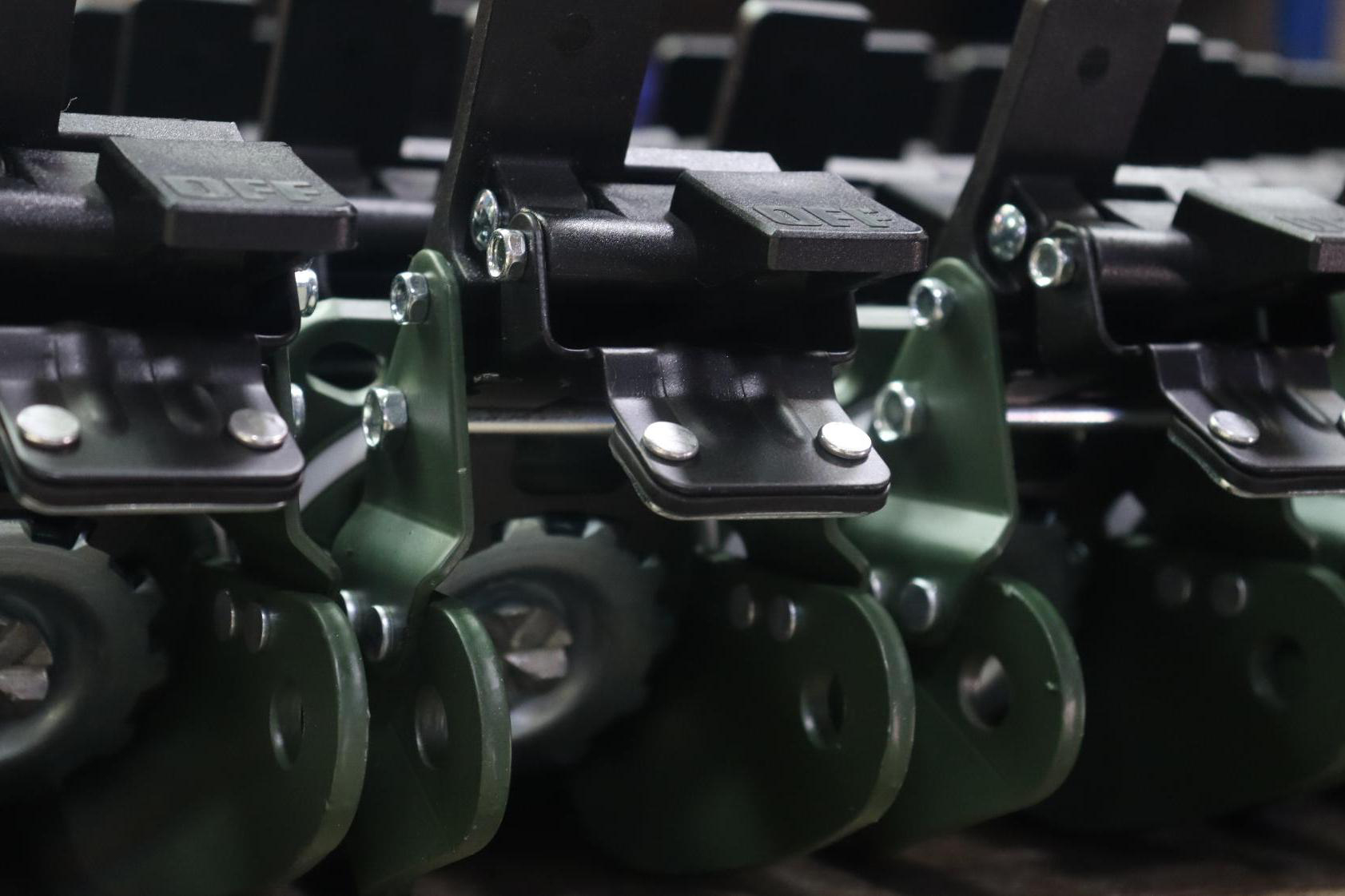 Green brake caster close-up detail