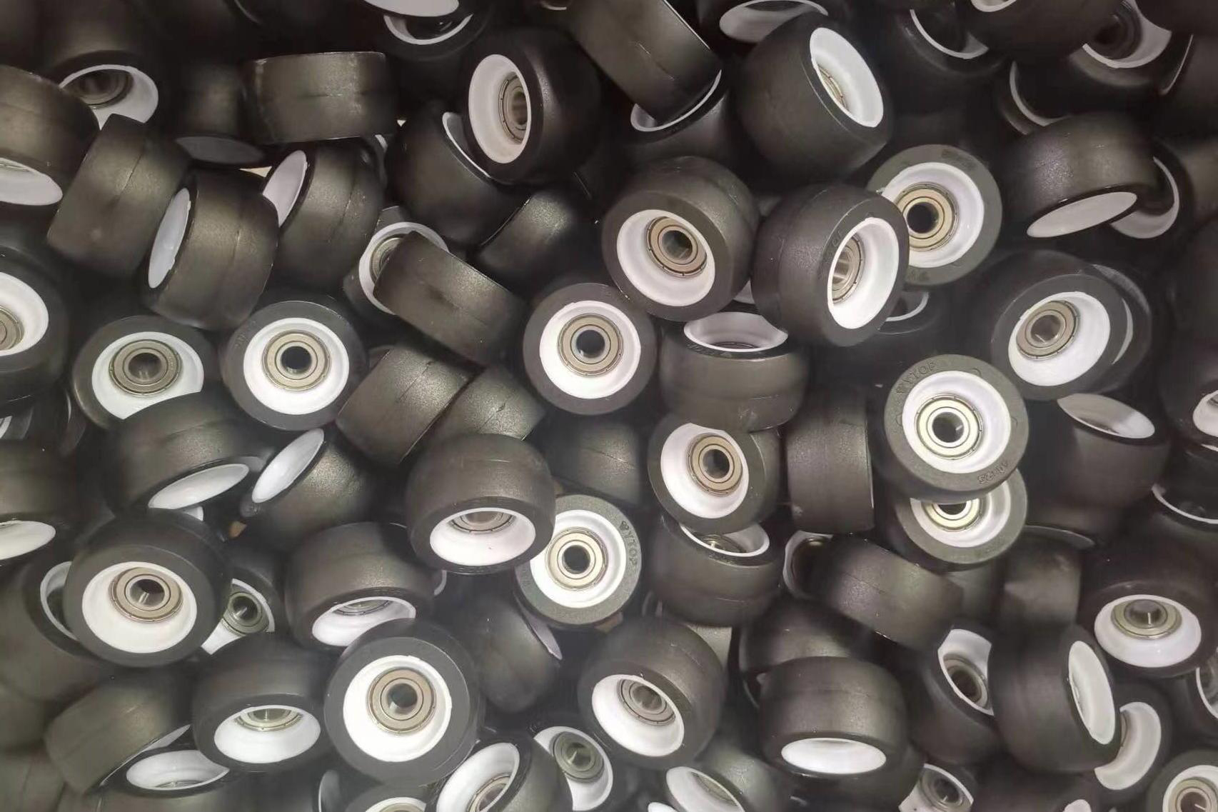 Array of blue TPU caster wheels manufactured by YTOP