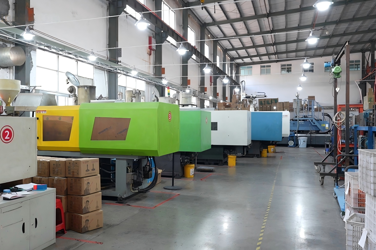 Injection molding machine producing caster wheels