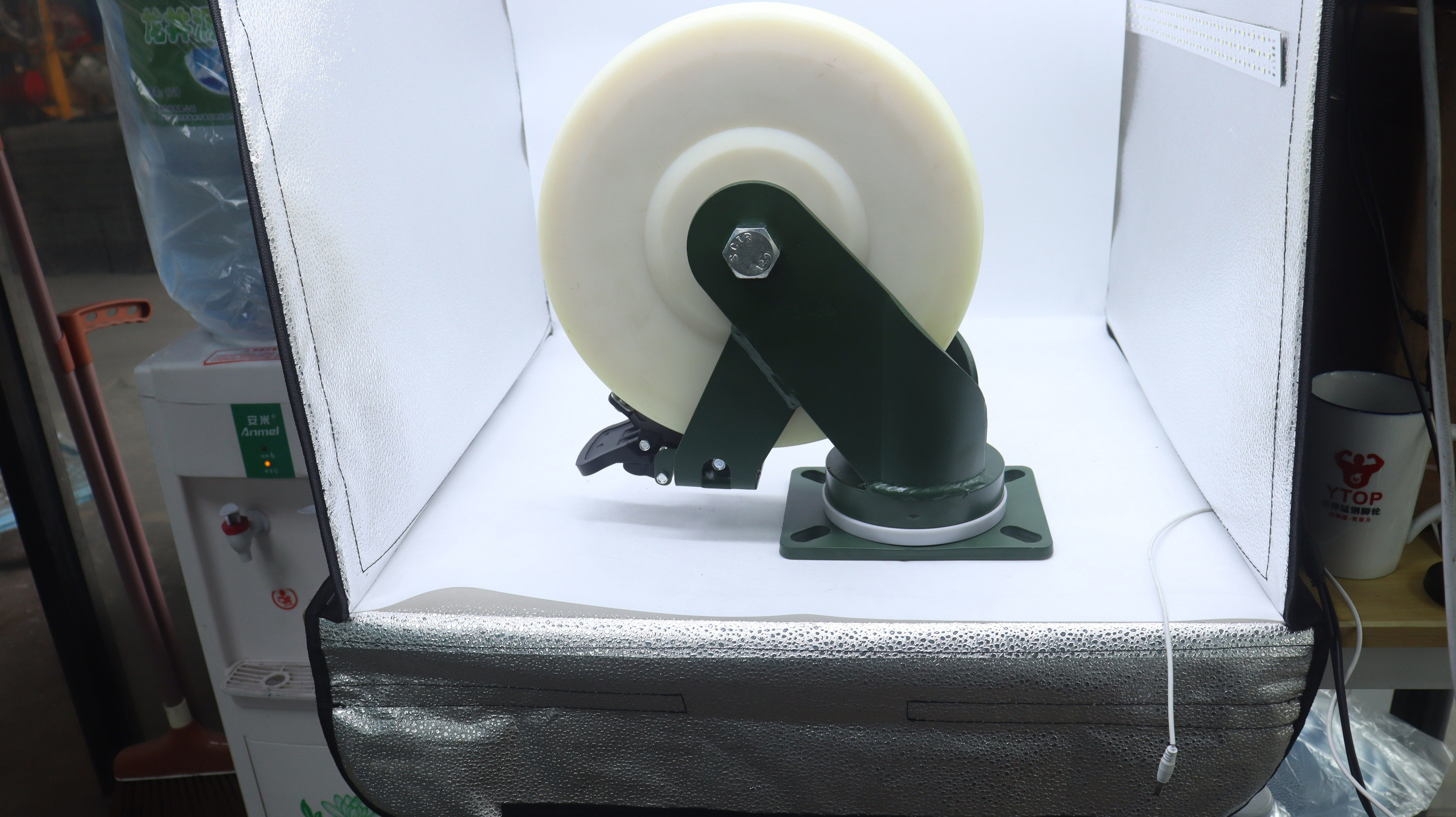 White heavy-duty nylon caster in studio