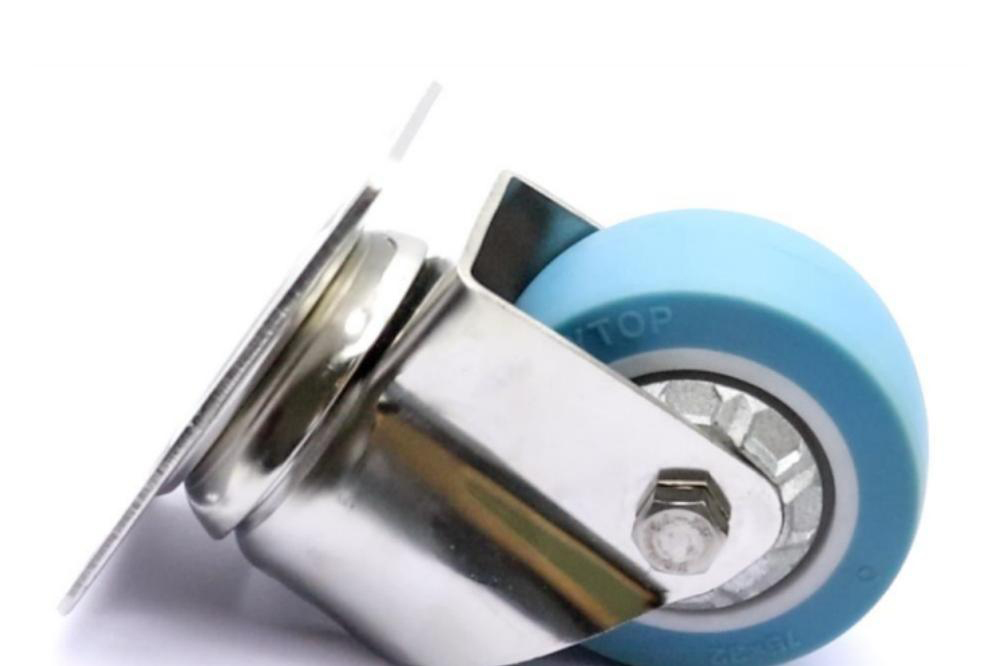 Stainless steel rigid caster showing material specification